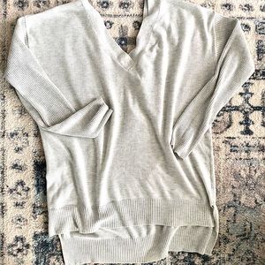 Light grey sweater with crisscross back